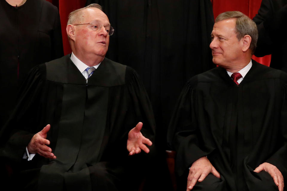 U.S. Supreme Court Justice Anthony Kennedy (L) chats with Chief Justice John Roberts (R) during a new U.S. Supreme Court family photo including Justice Neil Gorsuch (not pictured), their most recent addition, at the Supreme Court building in Washington, D.C., U.S., June 1, 2017.&amp;nbsp;