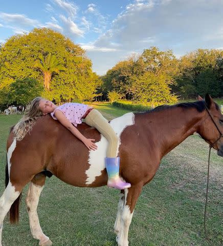 <p>Gisele Bundchen Instagram</p> Vivian Brady poses on a horse and recreates her mother Gisele Bündchen's 2001 'Vogue' cover.