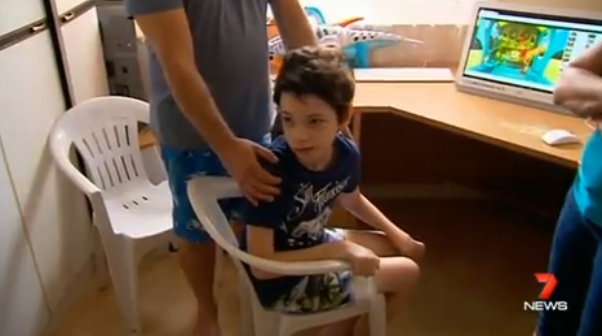 13-year-old Daniel was strapped into a chair at school so he couldn't walk around. Photo: 7 News