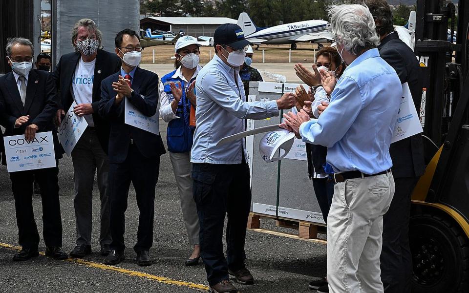 Honduran President Juan Orlando Hernandez receives the first shipment of 48,000 doses of the Oxford-AstraZeneca vaccine provided by the COVAX mechanism  - Orlando Sierra/AFP