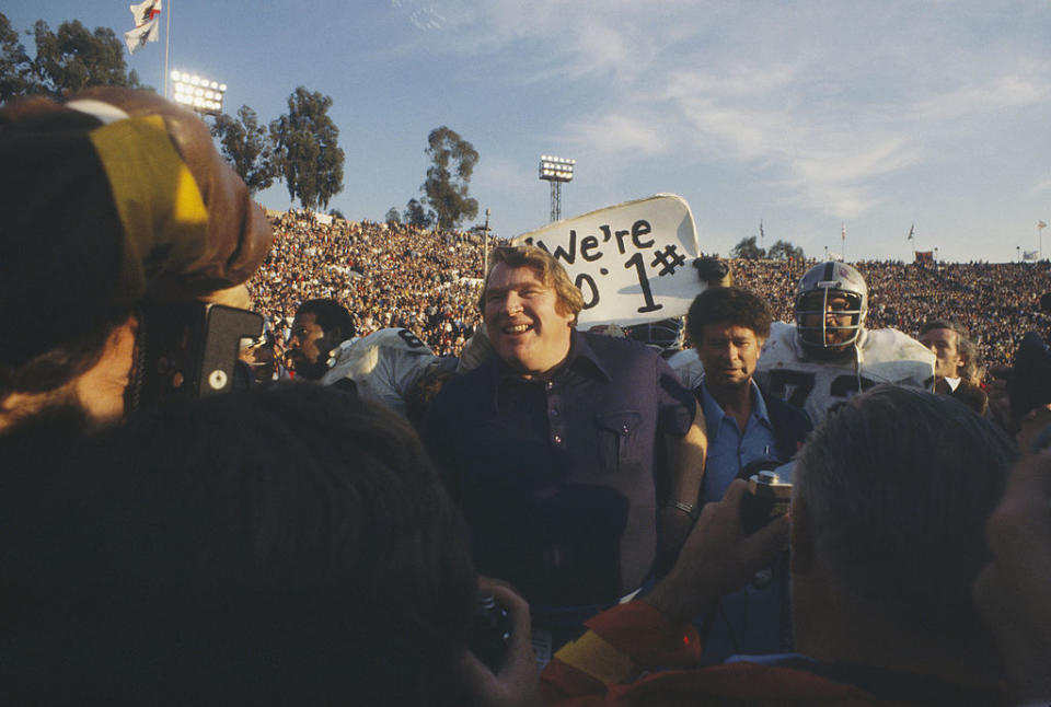 “Winning’s the great deodorant,” said John Madden, center, then head coach for the Oakland Raiders who had just won Super Bowl XI against the Minnesota Vikings, 32-14, at the Rose Bowl on January 9, 1977 in Pasadena, California. (Credit: Focus On Sports via Getty Images)