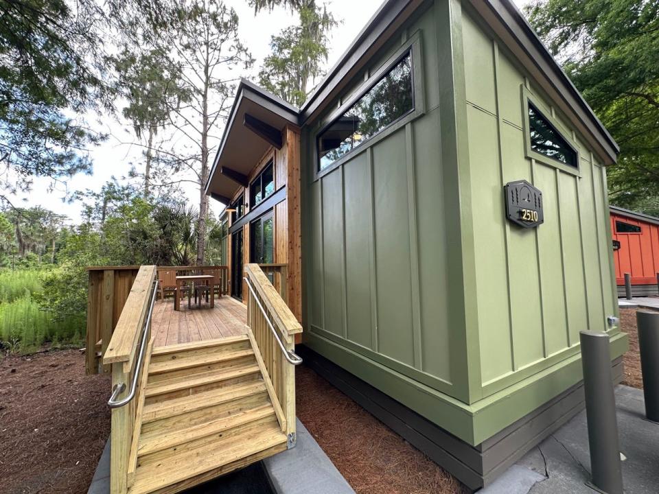 Exterior of cabin at Fort Wilderness with steps leading up to it