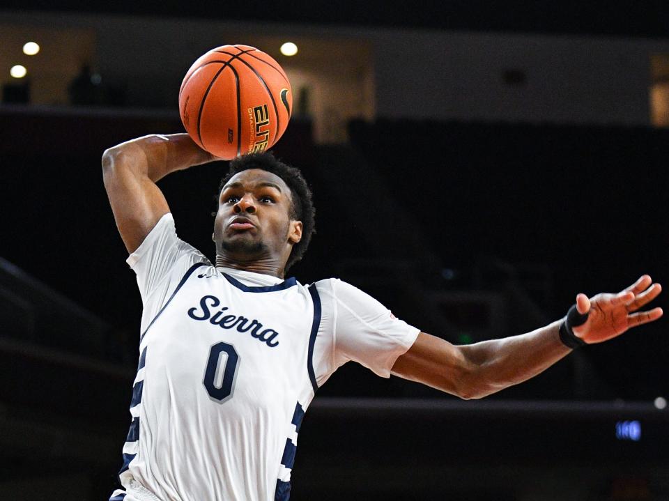 Sierra Canyon guard Bronny James goes up fro a dunk during a high school basketball game between Sierra Canyon and Wheeler in The Chosen-1's Invitational at Galen Center on January 7, 2023 i