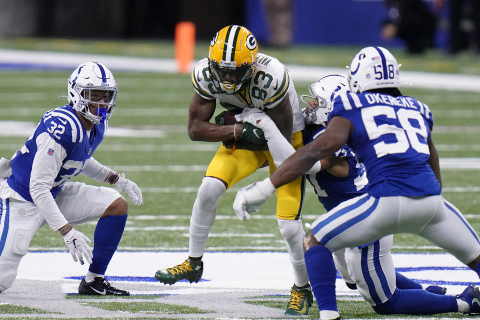 Green Bay Packers' Marquez Valdes-Scantling (83) is tackled by Indianapolis Colts' Khari Willis (37) during the second half of an NFL football game, Sunday, Nov. 22, 2020, in Indianapolis. (AP Photo/AJ Mast)