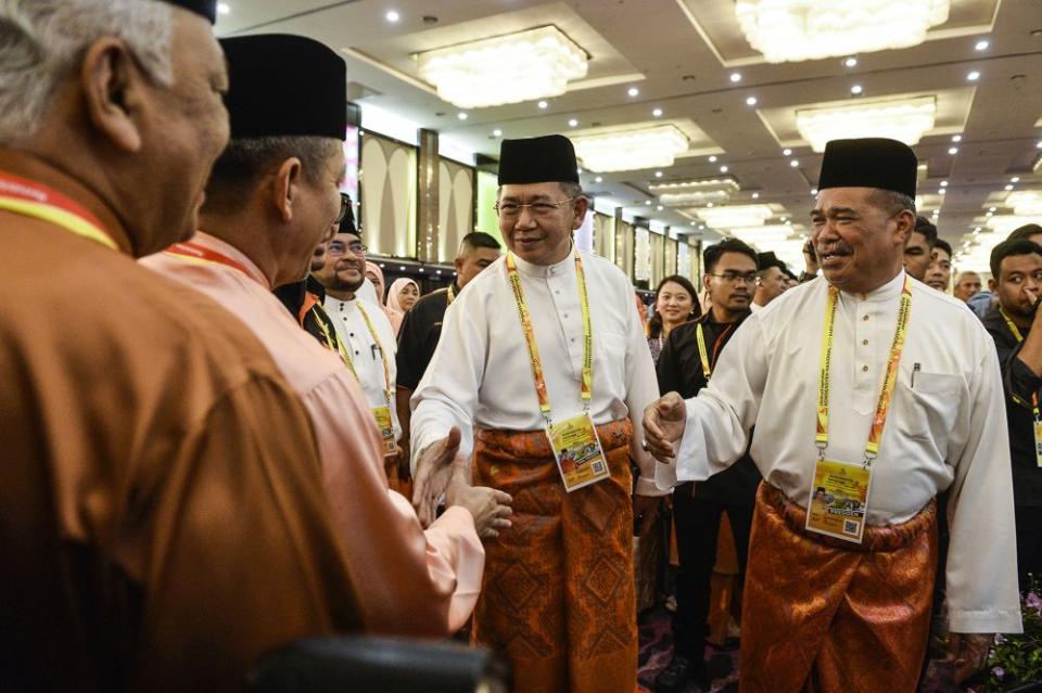 Amanah president Mohamad Sabu and Datuk Seri Salahuddin Ayub arrive for the Amanah National Convention in Shah Alam on December 6, 2019. ― Picture by Miera Zulyana