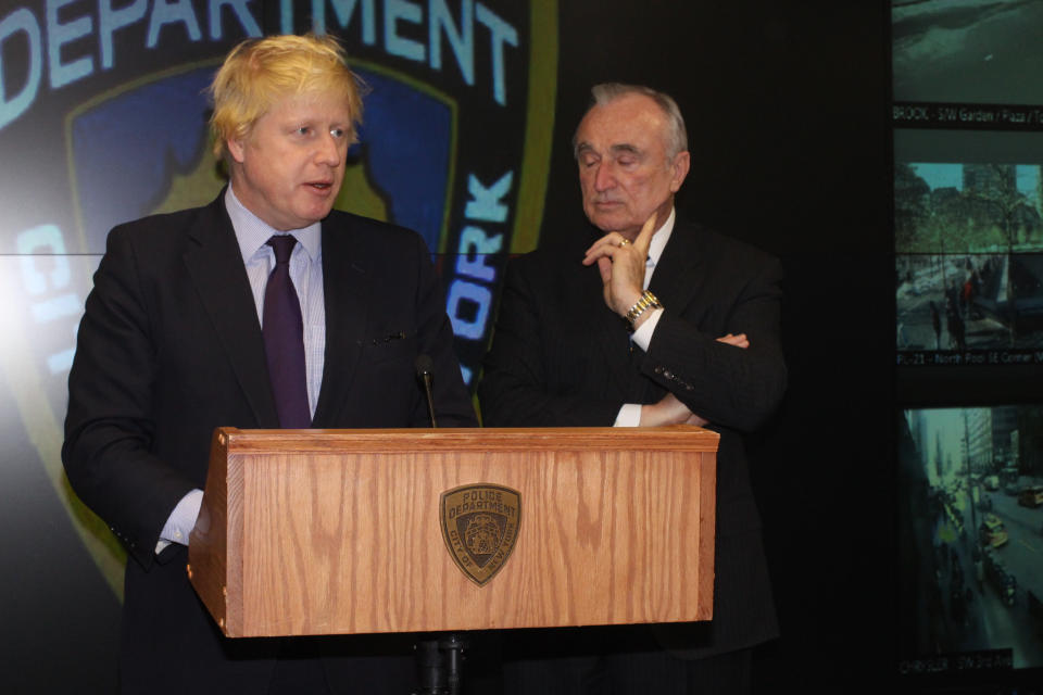 London Mayor Boris Johnson meets with Police Commissioner William Bratton at the NYPD's Lower Manhattan Security Initiative in New York City, on February 11, 2015. "We just had an extraordinary presentation on data collection of surveillance cameras and we are looking at New York as a leader in making that data work for us," Mayor Johnson said at a news conference on Wednesday. (Photo by John M. Mantel) *** Please Use Credit from Credit Field ***