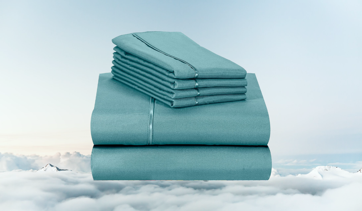 A set of folded teal bedsheets