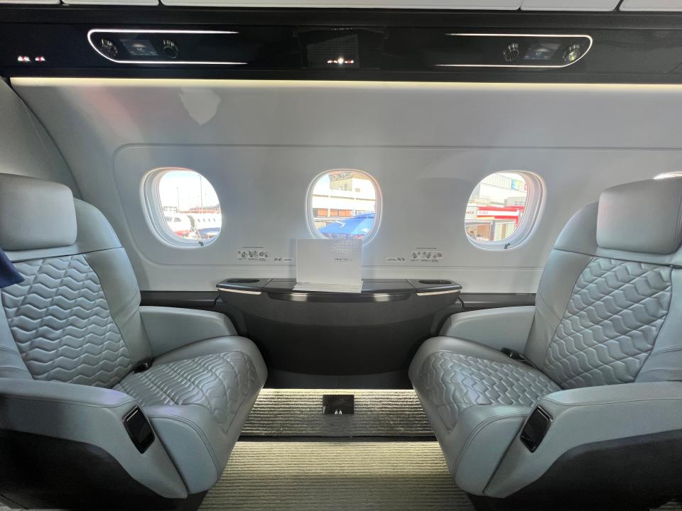 Two seats viewed from the side on an Embraer Praetor 600