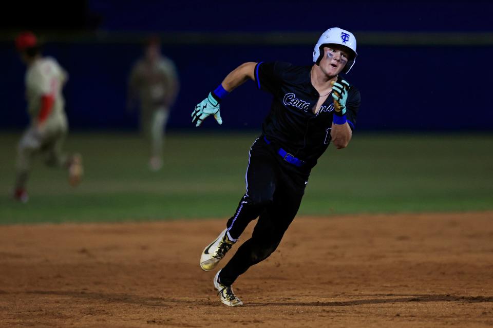 Trinity Christian's Aiden Arnett (17) rounds second base during the third inning of a FHSAA District 2-3A high school baseball tournament against Bishop Snyder.