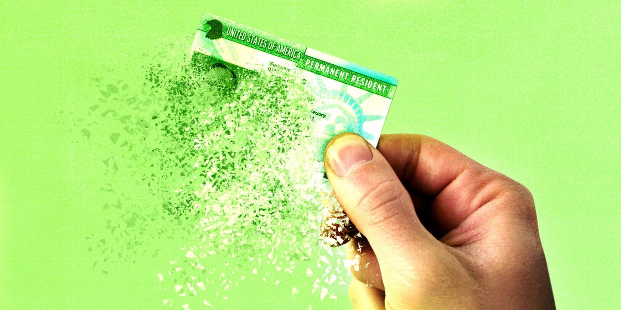 An illustration of a green card dissolving in front of a green background.