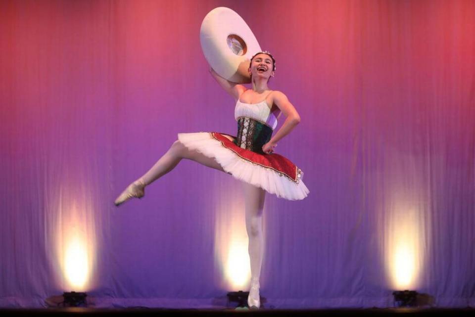 Valeria Suárez performs ‘Jarabe Tapatío’ from Jalisco at the Central East Danzantes de Tláloc 25th anniversary show at the Performing Arts Center on May 26, 2023.