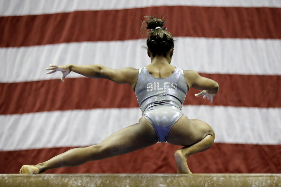 Simone Biles works on the beam during practice for the U.S. Gymnastics Championships Wednesday, Aug. 7, 2019, in Kansas City, Mo. (AP Photo/Charlie Riedel)