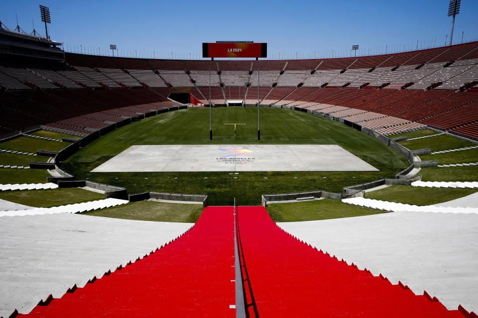 FILE - This May 11, 2017 file photo, shows the interior of the Los Angeles Memorial Coliseum in Los Angeles. The University of Southern California's sale of naming rights for Los Angeles Memorial Coliseum is being criticized as dishonoring the historic stadium's dedication as a memorial to soldiers who fought and died in World War I. USC announced last year that the stadium will be renamed United Airlines Memorial Coliseum as part of a $270 million renovation of the facility, which opened in 1923. (AP Photo/Jae C. Hong, File)