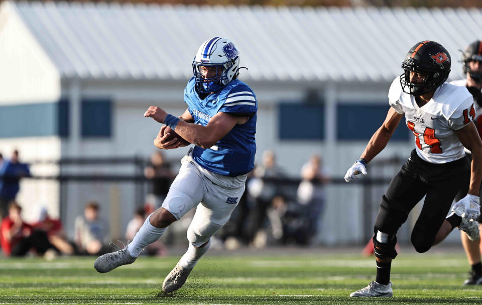 Simon Kenton quarterback Chase Crone (11) and Ryle defensive back Kaden Gardner (14) both collected multiple all-region football honors.