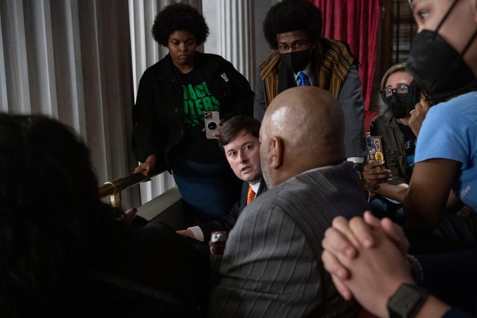 Rodney Wells, and RowVaughn Wells, parents of Tyre Nichols, speak with Rep. John Gillespie, R- Memphis, while Rep. Justin Pearson, D-Memphis, stands by, during a House session at the State Capitol in Nashville , Tenn., Monday, March 4, 2024.