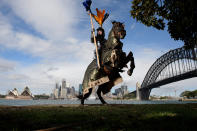 <p>Two-time World Medieval Jousting champion Rod Walker poses for a photograph on his horse “Crusader” in Sydney, Australia, Aug. 26, 2016. Walker is in Sydney training for the jousting tournament at the upcoming St Ives Medieval Faire, the only solid wood lance joust tournament in the southern hemisphere, which will take place on the September 24-25. (Photo: AAP/Dan Himbrechts/Reuters) </p>