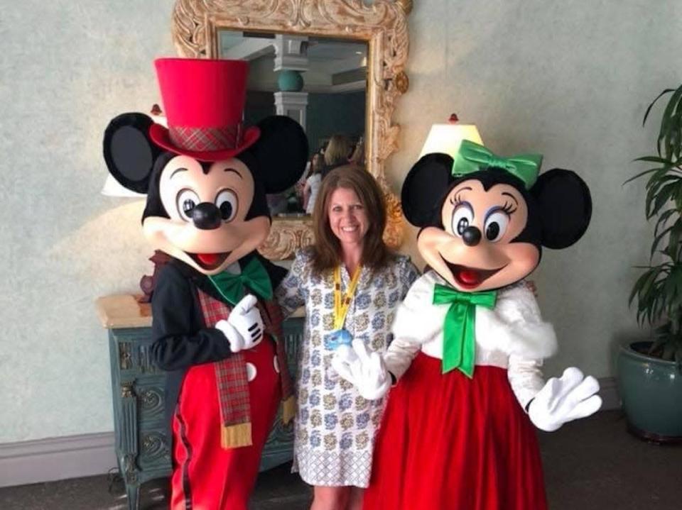 Kathryn Finkelstein and her family of four at frequent Disney&#39;s theme parks.