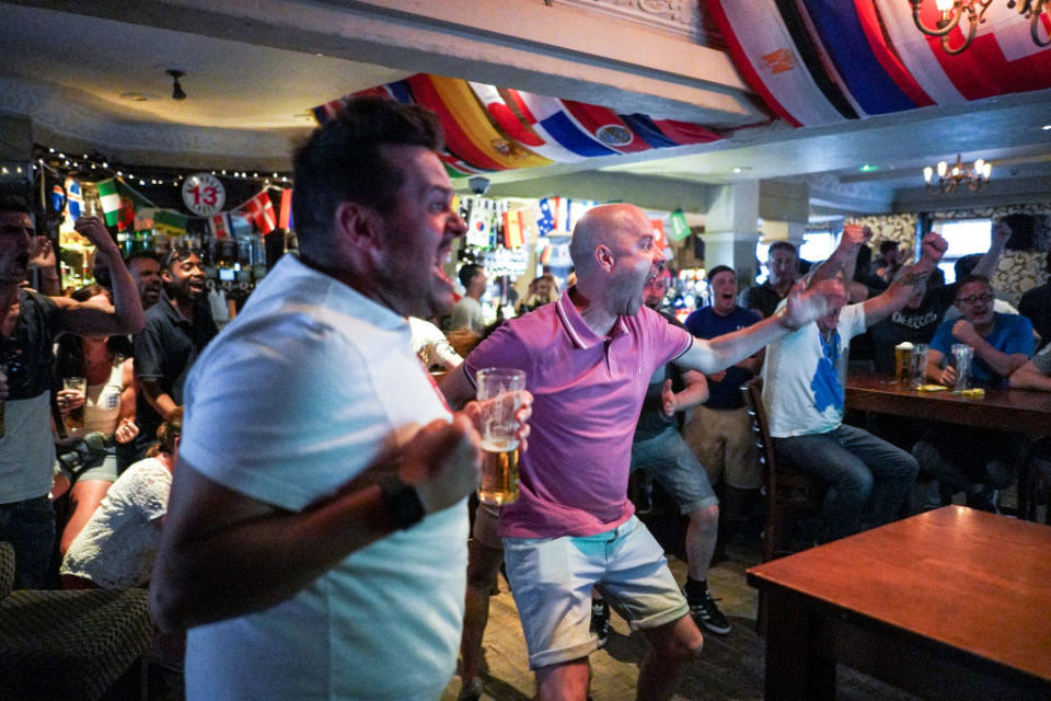 <p>Fans celebrated at the Royal Pavilion Tavern in Brighton as England shot their way to victory. (Picture: Getty) </p>