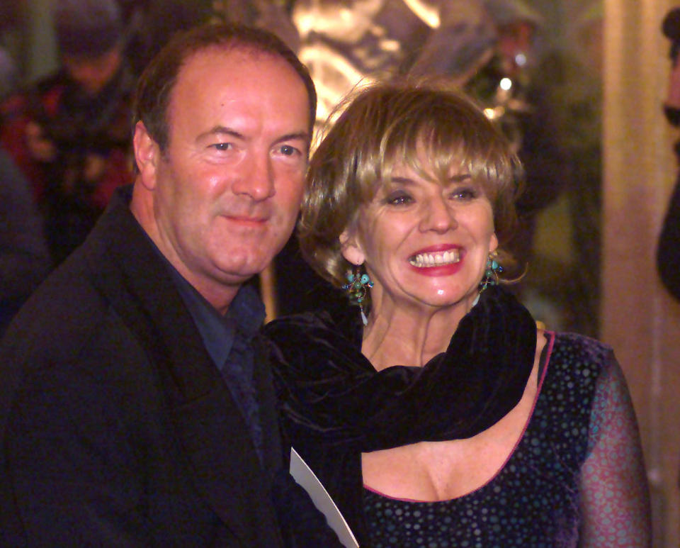 Actress Sue Johnston, who stars in BBC tv's The Royle Family, accompanied by actor Dean Sullivan, who plays Jimmy Corkhill in Brookside, arriving at the British Comedy Awards 2000 presentation, in London.