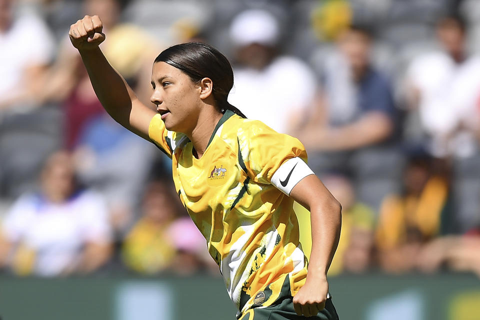 Sam Kerr of the Matildas celebrates after scoring a goal during the Women's International friendly soccer match between the Australia and Chile at Bankwest Stadium in Sydney, Saturday, Nov. 9, 2019. Football Federation Australia said a record crowd of 20,029 were attracted for the women's soccer match in Australia. (Dan Himbrechts/AAP Image via AP)