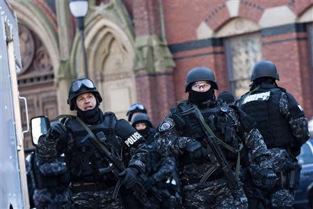 State and local police respond to reports of explosives at Harvard University in Cambridge, Massachusetts, December 16, 2013. REUTERS/Dominick Reuter