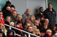 <p>Arsenal manager Arsene Wenger watches the action from the stands </p>