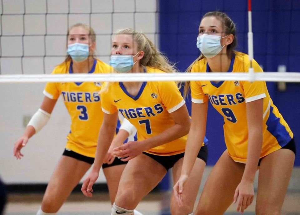 Howards Grove's Saige Damrow (3), Abigail Teunisse (7) and Josie Halbleib (9) concentrate on the action from Sheboygan Christian on Sept. 17, 2020, in Howards Grove.