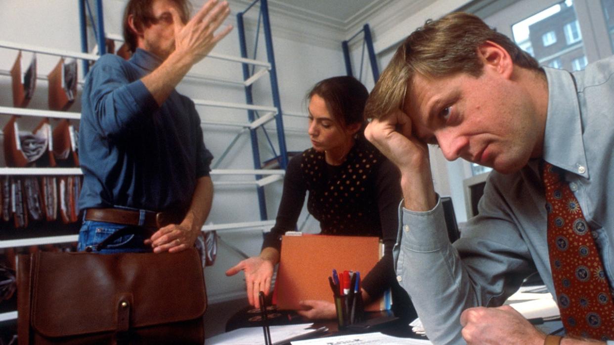 <div>Stressed business people at work. (Photo by Liaison)</div>