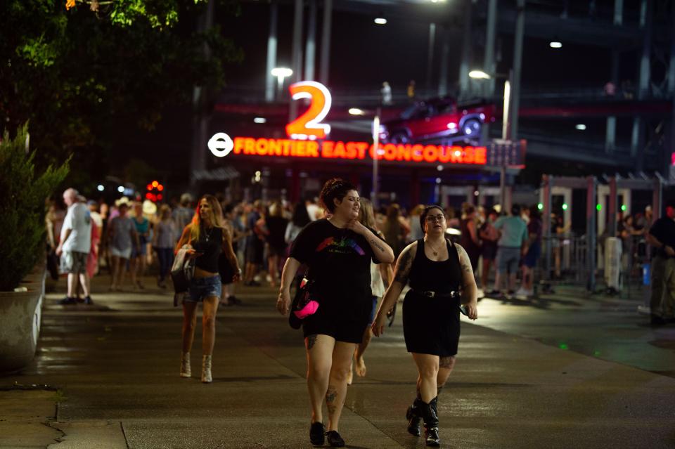 Fans leave the stadium after hearing the Garth Brooks concert has been postponed due to weather at Nissan Stadium in Nashville, Tenn., Saturday, July 31, 2021.