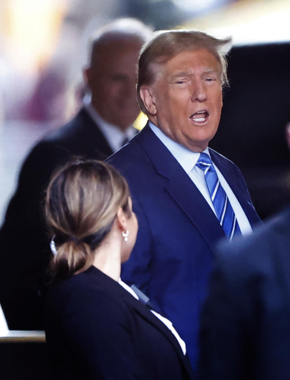 Former President Donald Trump, leaves Trump Tower for Manhattan Criminal Court Tuesday, April 16, 2024, in New York. Trump is set to return to court as a judge works to find a panel of jurors who'll decide whether the former president is guilty of criminal charges alleging he falsified business records to cover up a sex scandal during the 2016 campaign. (AP Photo/Noah K. Murray)