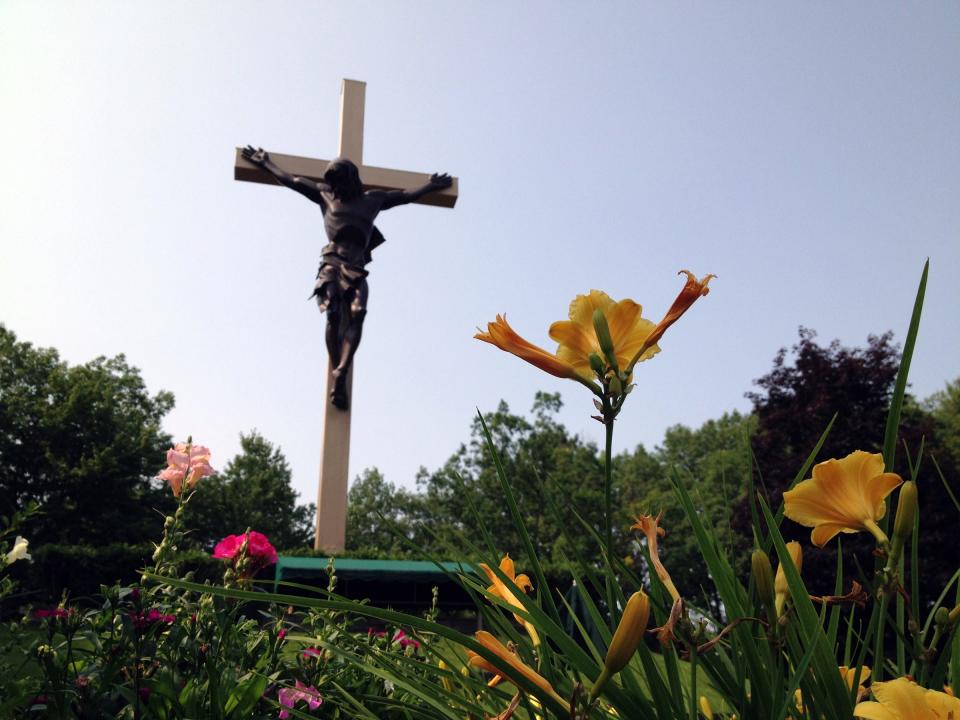 At Cross in the Woods in Indian River, an outdoor 55-foot tall cross has a 7-ton Jesus Christ sculpture.
