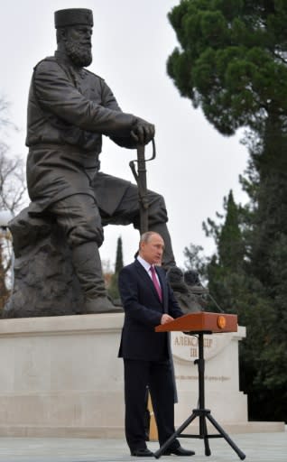 Vladimir Putin "does not worship Nicholas II" but his father Alexander III, said Orthodox Church expert Ksenia Luchenko. The Russian president is shown here unveiling a monument to Alexander III in Yalta, Crimea, last year