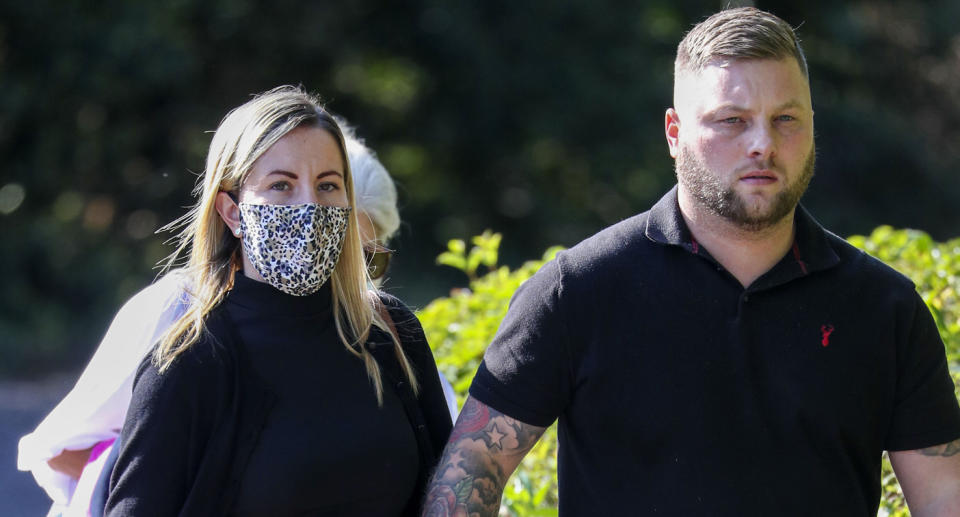 Kandice Barber (left) and her husband (right) leave court