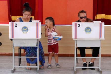 People vote in country's presidential elections at a polling station in Ulaanbaatar, Mongolia June 26, 2017. REUTERS/B. Rentsendorj