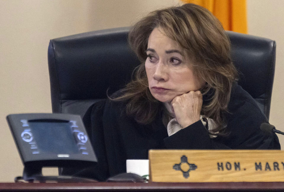 District judge Mary Marlowe Sommer listens to FBI forensic examiner Bryce Ziegler testify during Hannah Gutierrez-Reed's trial at District Court, Monday, Feb. 26, 2024, in Santa Fe, N.M. Gutierrez-Reed is charged with involuntary manslaughter and tampering with evidence in the October 2021 death of cinematographer Halyna Hutchins during the filming of the Western “Rust”. (Luis Sánchez Saturno/Santa Fe New Mexican via AP, Pool)