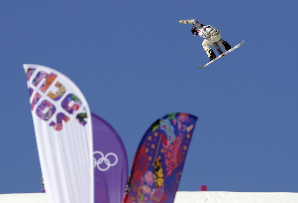 United States' Ryan Stassel takes a jump during the men's snowboard slopestyle qualifying at the Rosa Khutor Extreme Park ahead of the 2014 Winter Olympics, Thursday, Feb. 6, 2014, in Krasnaya Polyana, Russia. (AP Photo/Andy Wong)