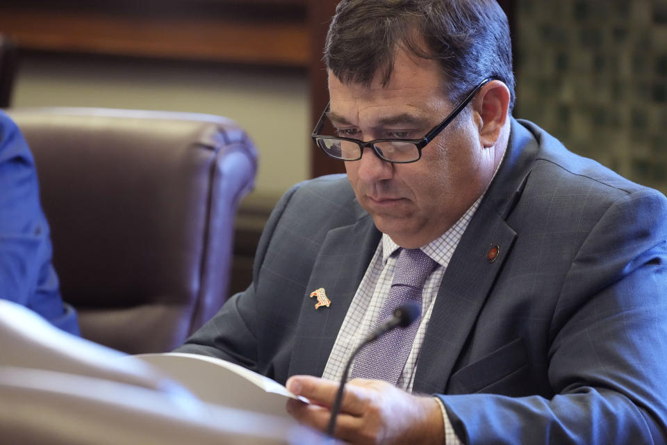 Mississippi State Senate Judiciary B Committee member Sen. Andy Berry, R-Simpson County, reviews legislation that would restore suffrage for some people convicted of felonies in the past, Monday, April 22, 2024, at the state Capitol in Jackson, Miss. The bills that were approved by the committee will be presented before the Senate for its approval. (AP Photo/Rogelio V. Solis)