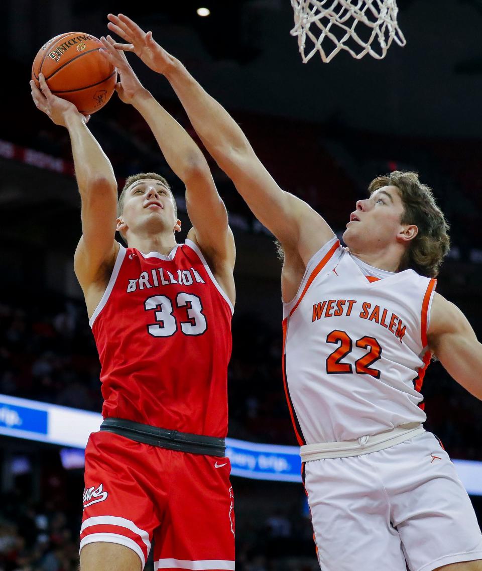 Brillion's Jeremy Lorenz (33) attempts a shot against West Salem's Brett McConkey during the WIAA Division 3 boys basketball state championship game March 18 in Madison.