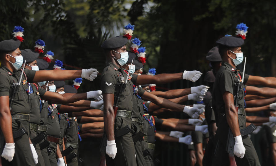 Sri Lankan army soldiers march during the 73rd Independence Day parade rehearsal in Colombo, Sri Lanka, Wednesday, Feb. 3, 2021. Sri Lanka's independence from British colonial rule is celebrated on Feb. 4 each year. (AP Photo/Eranga Jayawardena)
