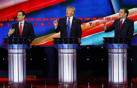 Republican U.S. presidential candidates (L-R) U.S. Senator Marco Rubio, Donald Trump and Senator Ted Cruz speak at the debate sponsored by CNN for the 2016 Republican U.S. presidential candidates in Houston, Texas, February 25, 2016. REUTERS/Mike Stone