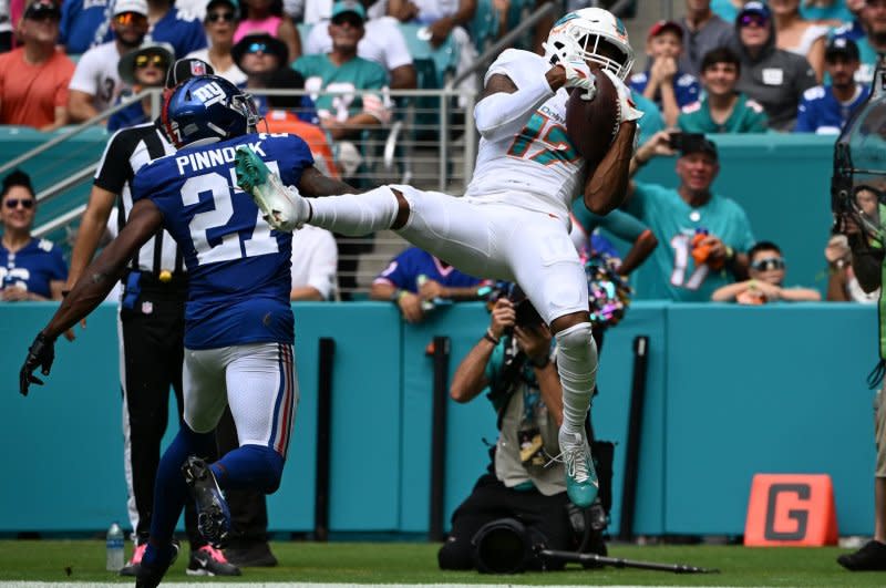 Miami Dolphins wide receiver Jaylen Waddle scores a touchdown in the first quarter against the New York Giants on Sunday at Hard Rock Stadium in Miami Gardens, Fla. Photo by Larry Marano/UPI
