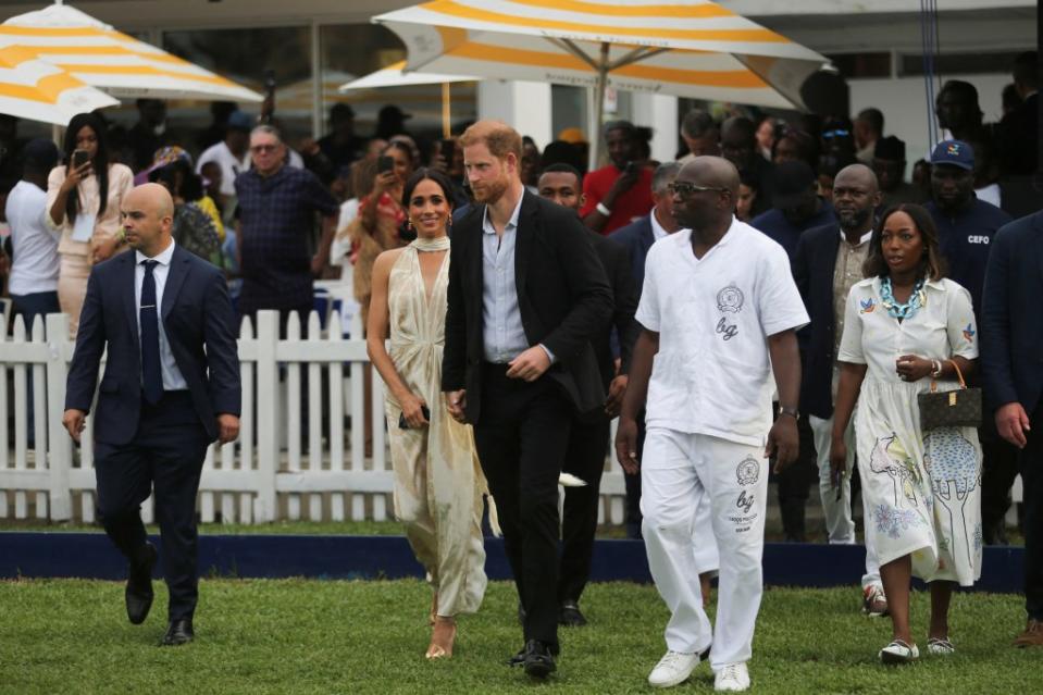 Meghan Markle and Prince Harry at a polo event in Lagos. REUTERS