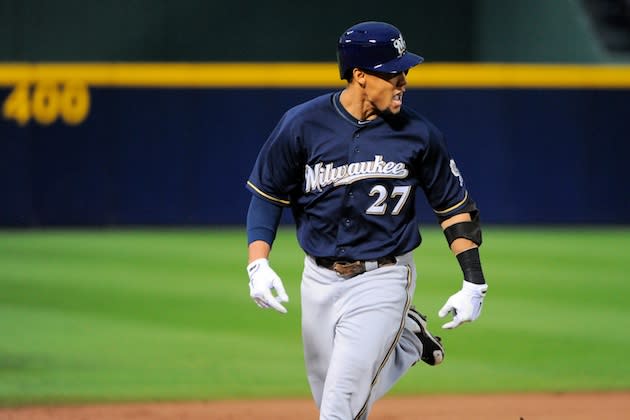 Benches clear after Carlos Gomez homers, argues with Braves and Brian  McCann blocks him from going home