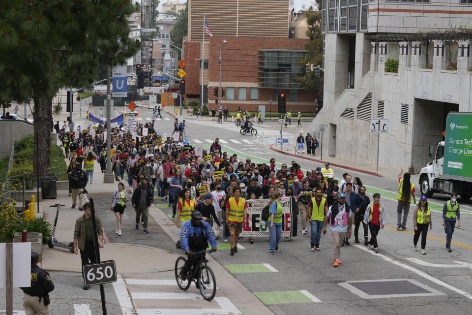 Demonstrators march on the UCLA campus Wednesday, June 12, 2024, in Los Angeles. The president of the University of Miami has been chosen to become the next chancellor of the University of California, Los Angeles, where the retiring incumbent is leaving a campus roiled by protests against Israel's war in Gaza. (AP Photo/Damian Dovarganes)