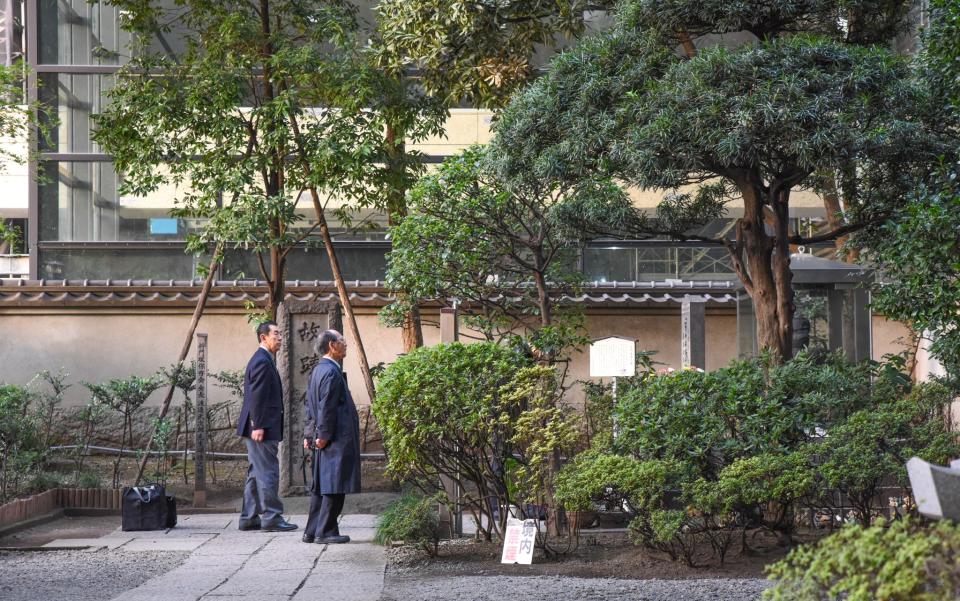 "The reverence shown by a stream of suited Japanese businessmen gave me the impression it was a shrine to a Buddhist or Shinto deity" - ronan o'connell