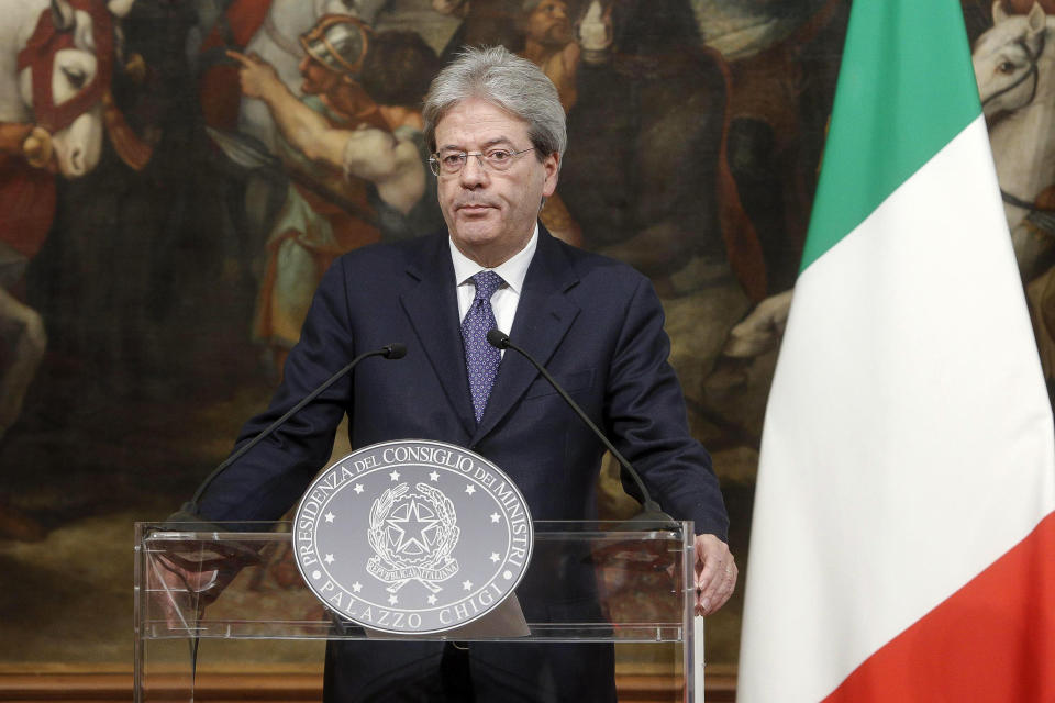 Italian Premier Paolo Gentiloni gives a press conference on the killing in Italy of suspected attacker at the Berlin Christmas market, during a press conference at Chigi Palace in Rome, Italy, Friday, Dec. 23, 2016. Gentiloni said Friday that he had called German Chancellor Angela Merkel to inform her that the man suspected of Monday's terrorist attack in Berlin had been killed near Milan. (Giuseppe Lami/ANSA via AP)