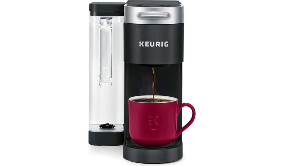 Keurig coffee maker with mug.