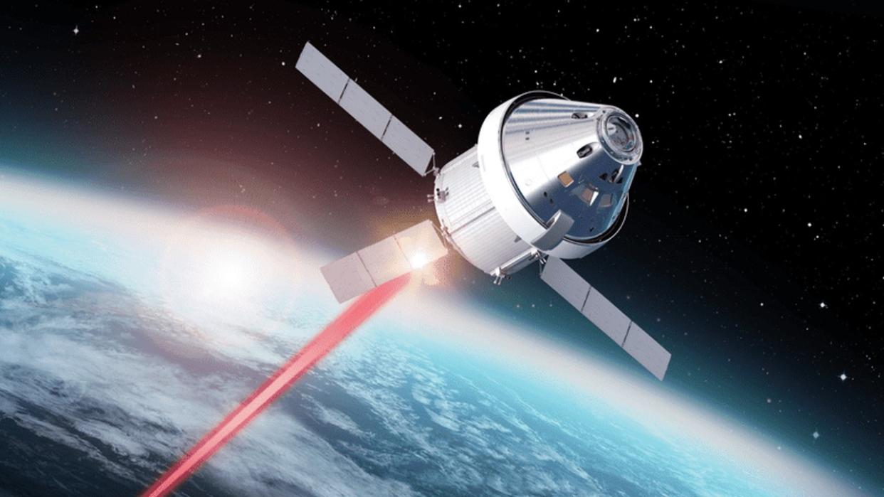  the orion spacecraft beams a red laser down to Earth 