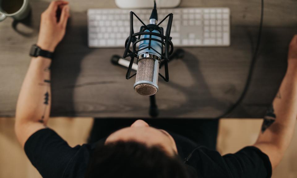 <span>A voice actor at work. Companies may come to regret the lack of human connection if the voice reading an audiobook is AI-generated, Simon Kennedy says.</span><span>Photograph: visualspace/Getty Images</span>