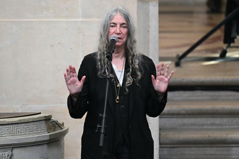 Patti Smith performs during the induction ceremony into the institution of the US photographer Annie Leibovitz at the Institut de France in Paris, on March 20, 2024.